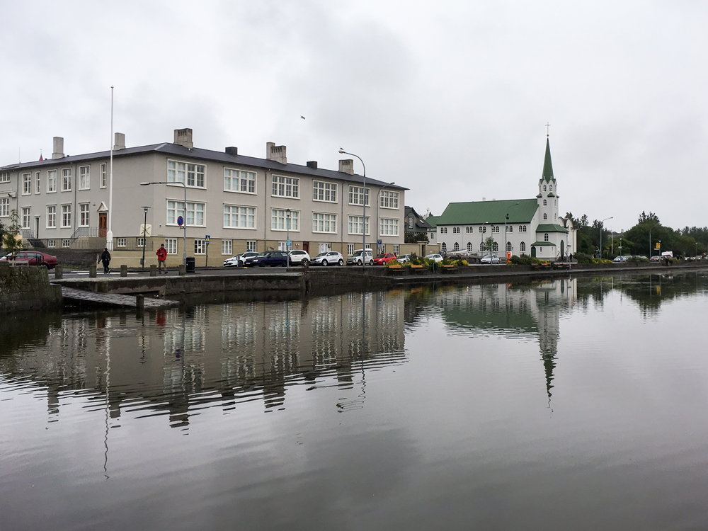 Buildings across the street from the pond